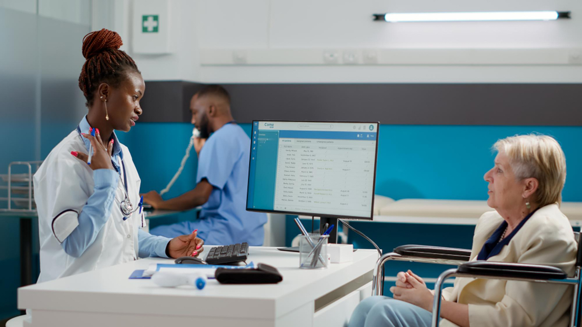 A doctor speaking to a patient