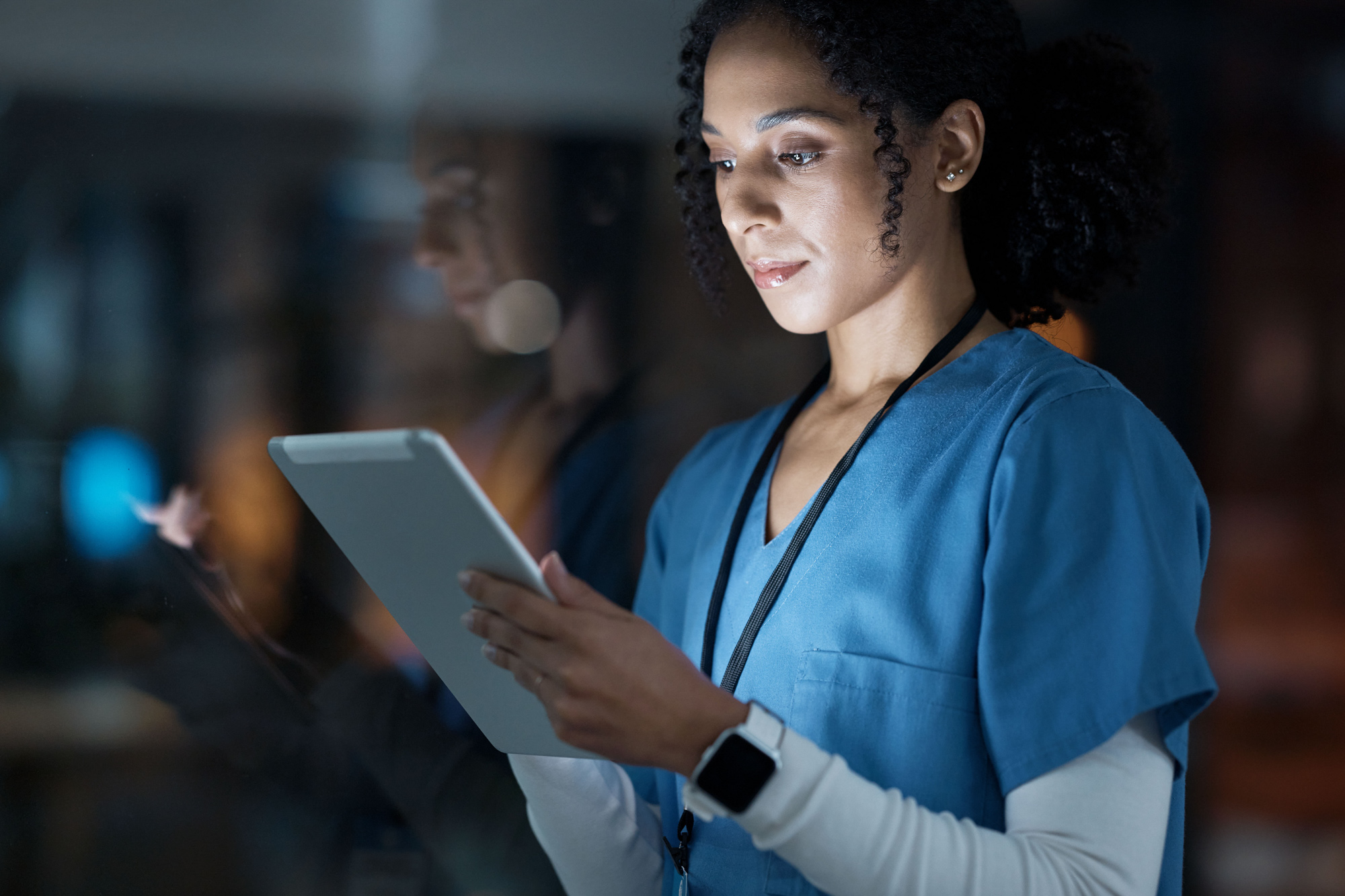A nurse using a tablet