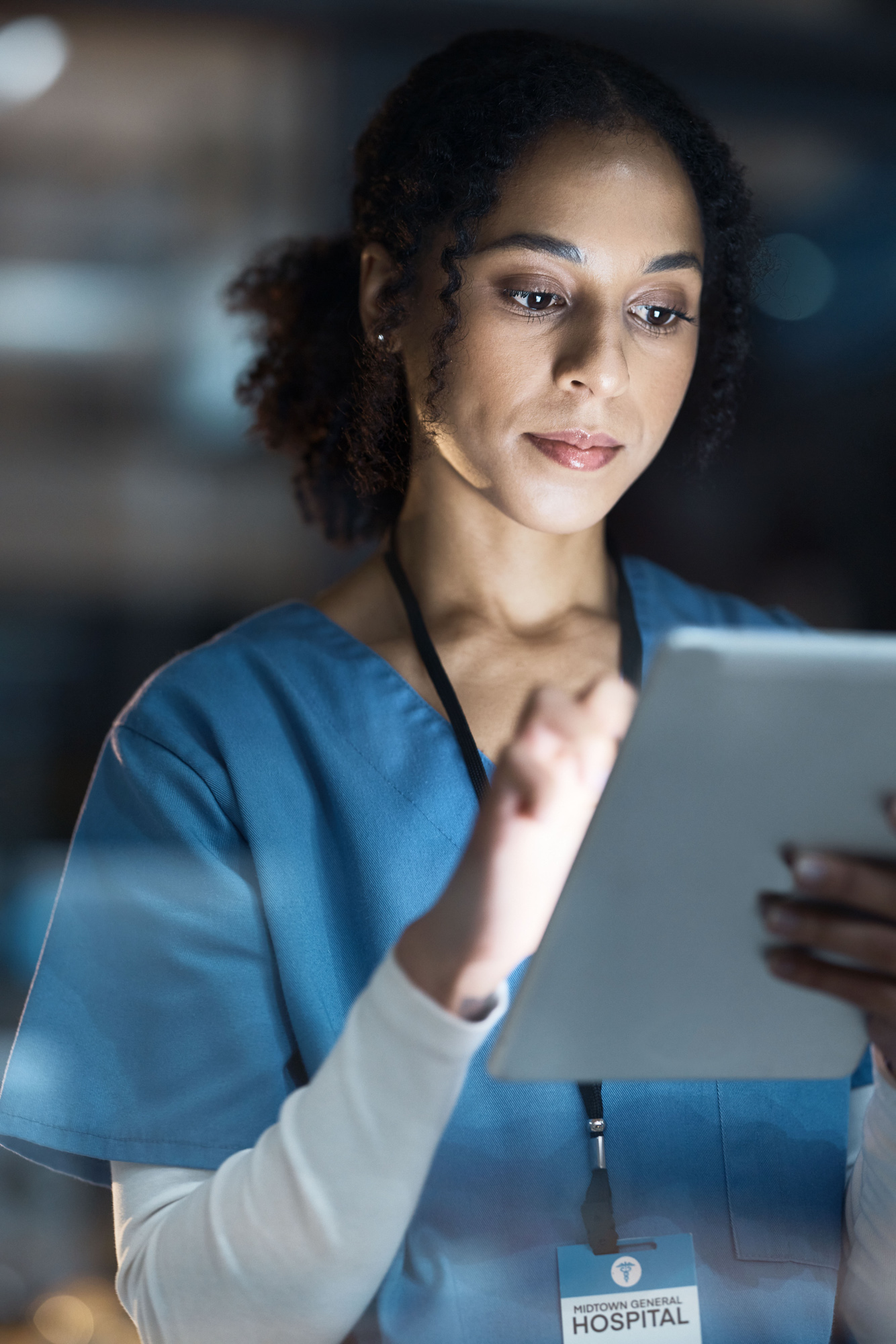 A nurse using a tablet