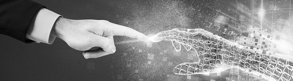 A human hand (left) and a digital hand (right) pointing at each other.