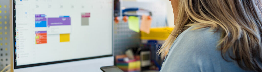 A woman on a computer.